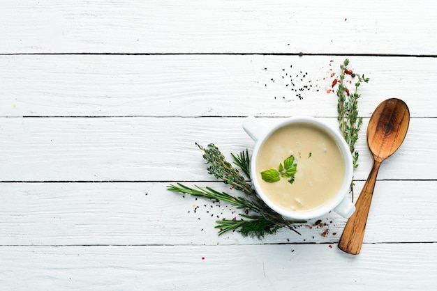 Bowl of soup with herbs